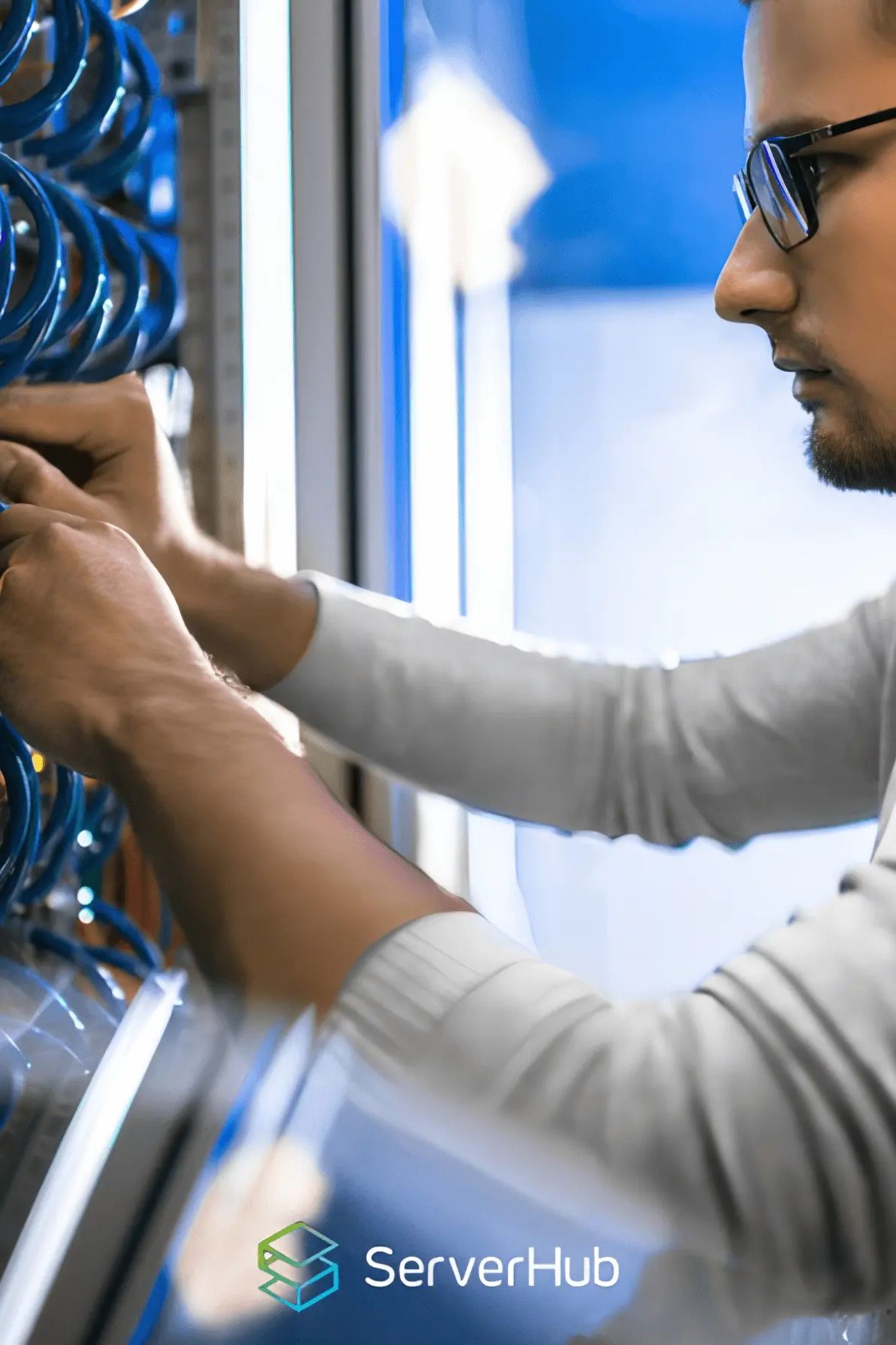 Serverhub photo Technical engineer wiring network rack HomeHeader